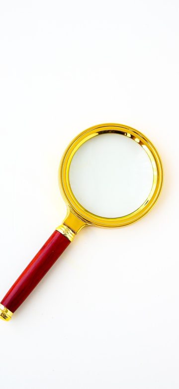 符号大全 App 搜索与结果界面截图，输入关键词后列出匹配符号与中文释义，酒红高亮命中项